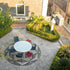 Modern Plano Outdoor Round Dining Table by Paola Lenti Handcrafted  Concrete Top with Steel Base Casa Design Group