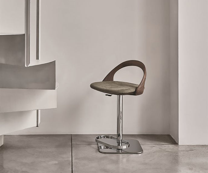Porada Ester Lift adjustable bar stool with a solid wood frame and upholstered swivel seat | Casa Design Group