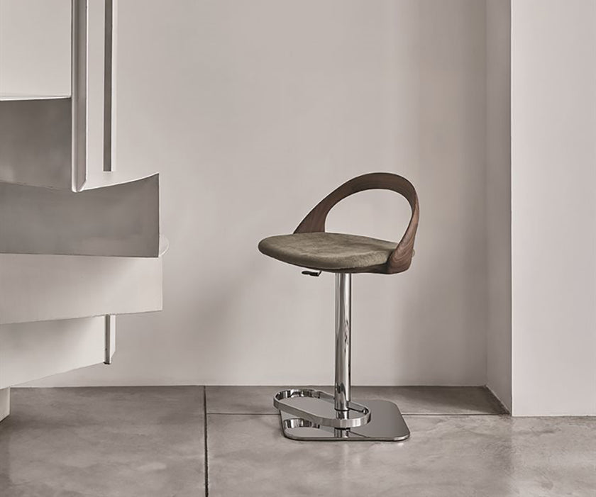 Porada Ester Lift adjustable bar stool with a solid wood frame and upholstered swivel seat | Casa Design Group