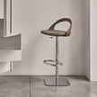 Porada Ester Lift adjustable bar stool with a solid wood frame and upholstered swivel seat | Casa Design Group