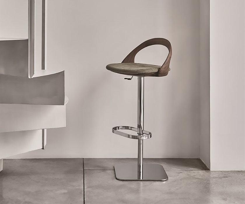 Porada Ester Lift adjustable bar stool with a solid wood frame and upholstered swivel seat | Casa Design Group