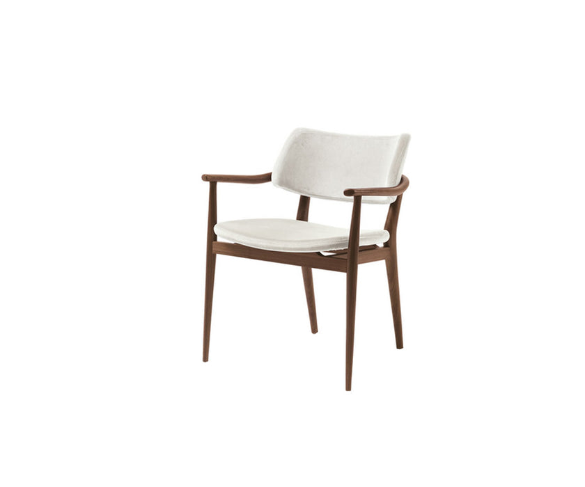 Porada Nissa dining armchair with a solid Canaletta walnut frame and fabric or leather upholstery | Casa Design Group