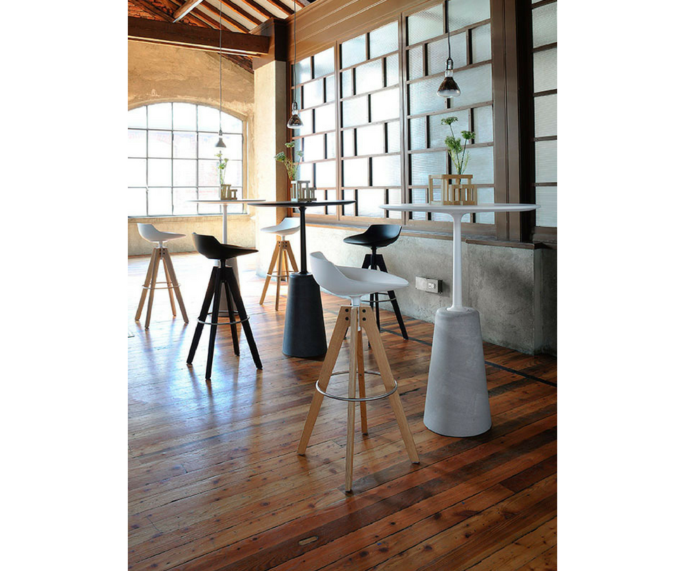 Rock Table by MDF Italia with sculptural concrete base Casa Design Group
