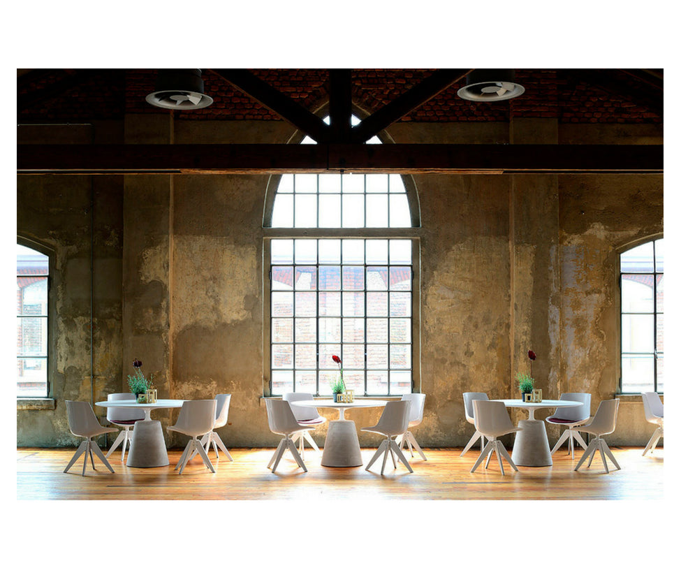 Rock Table by MDF Italia with sculptural concrete base Casa Design Group
