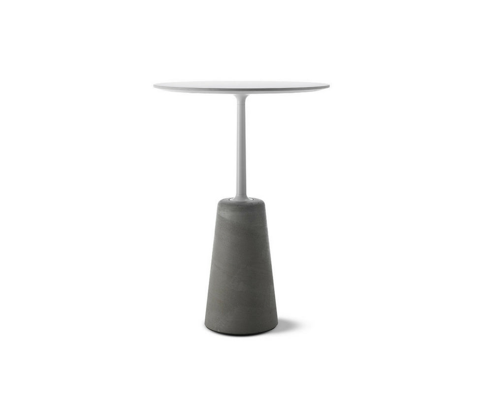 Rock Table by MDF Italia with sculptural concrete base Casa Design Group