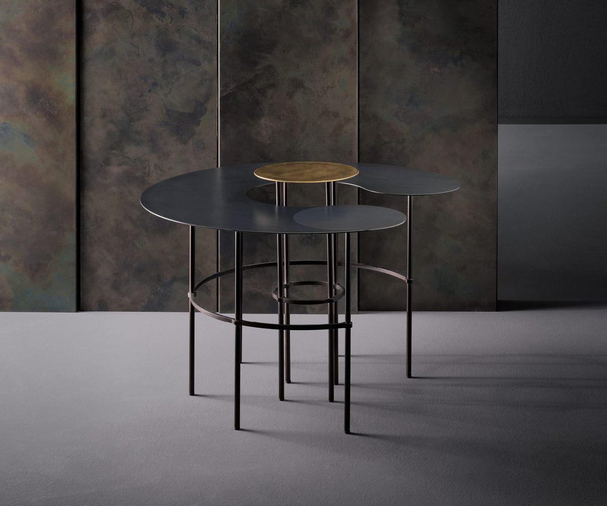 Scribble Coffee Tables by De Castelli with sculptural curved metal forms and artistic finishes – Casa Design Group