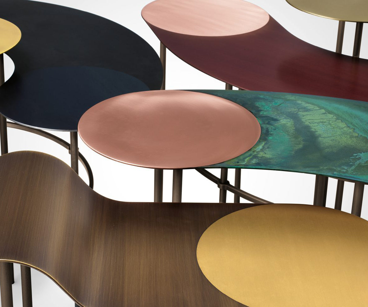 Scribble Coffee Tables by De Castelli with sculptural curved metal forms and artistic finishes – Casa Design Group