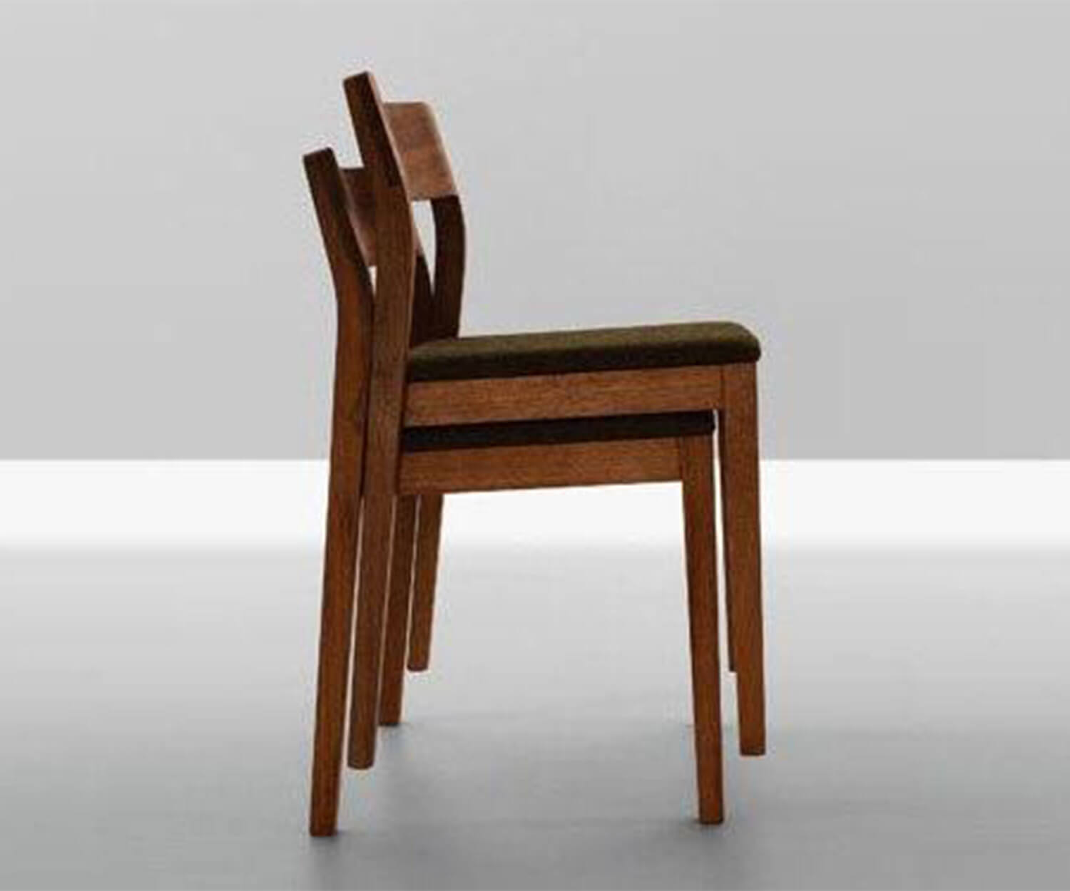 Sit Dining Chair by Zeitraum featuring solid wood construction, stackable functionality, and timeless contemporary design | Casa Design Group