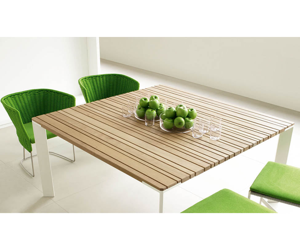 Elegant Sunset Outdoor Dining Table by Paola Lenti Casa Design Group