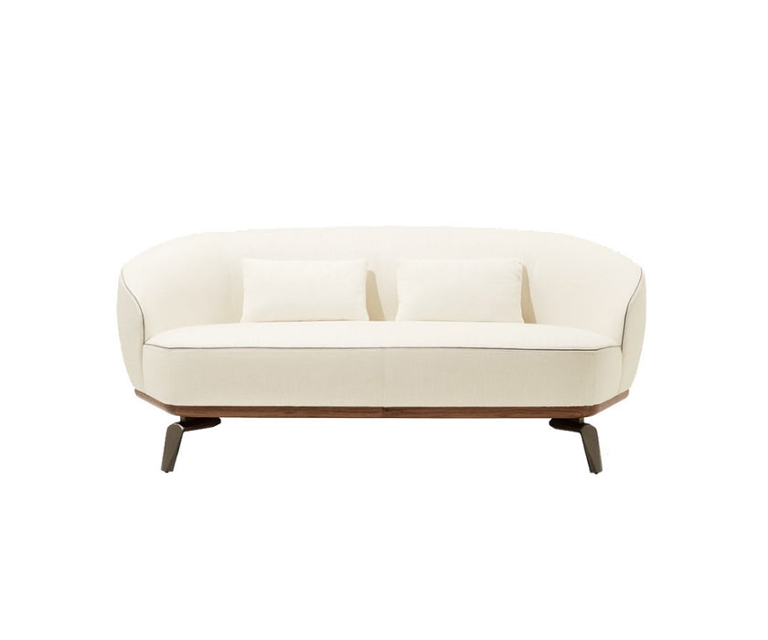 Tamino Sofa by Giorgetti with Canaletto walnut structure and refined contemporary design | Casa Design Group