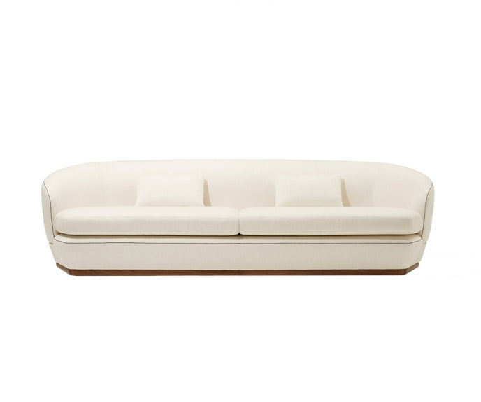 Tamino Sofa by Giorgetti with Canaletto walnut structure and refined contemporary design | Casa Design Group